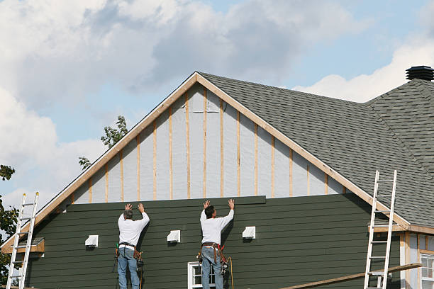 Professional Siding technician working in Greensboro, NC